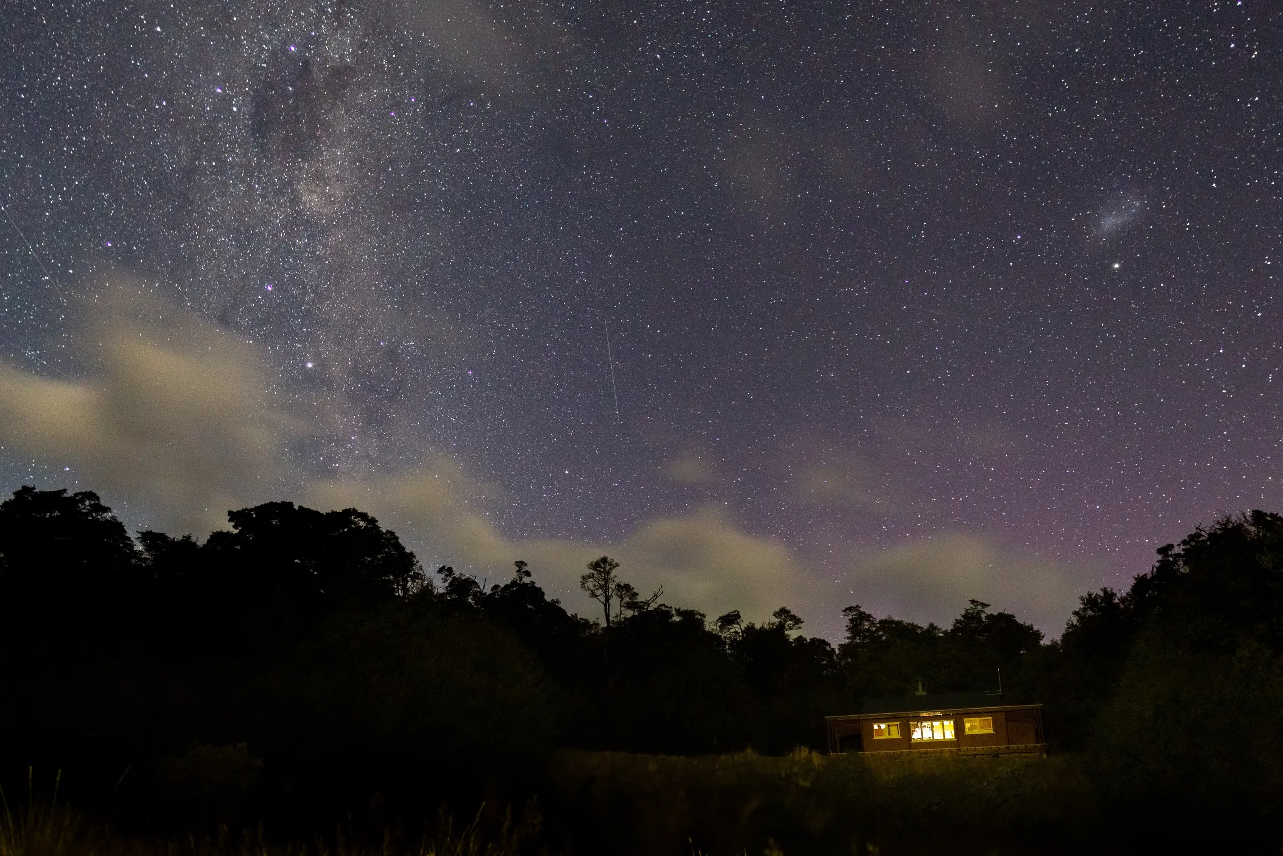 The night allowed for some good astrophotography before the cloud rolled in. Visible is Hamilton Hut and the bank upon which it sits.
